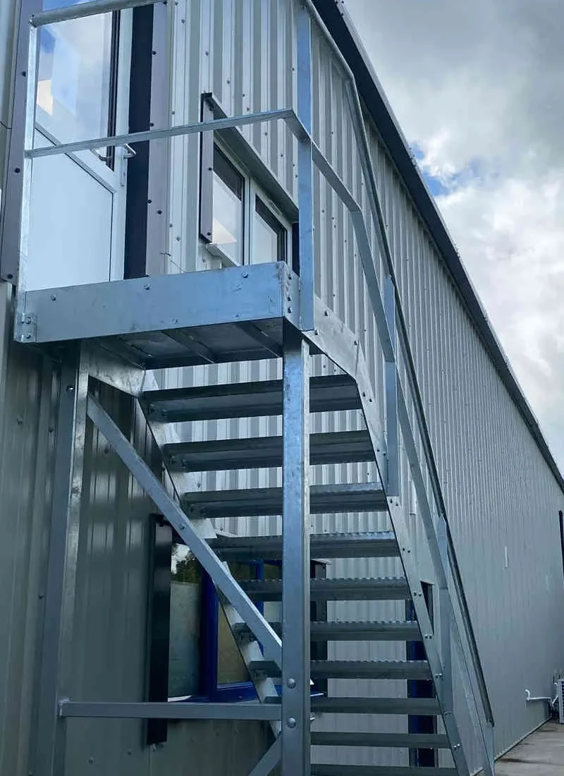External steel fire escape staircase to a first floor industrial unit