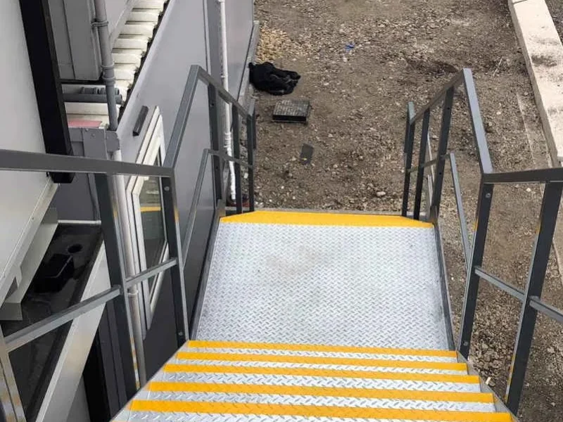 Fire escape treads with yellow anti-slip nosings to current regulations