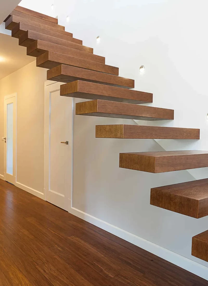 Oak-topped cantilever floating staircase in a domestic hallway