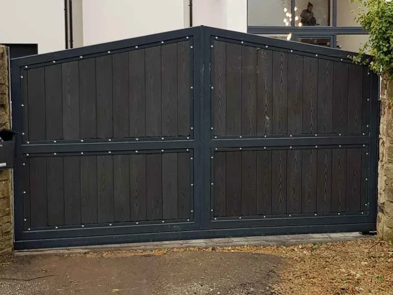 Timber clad steel-framed driveway gates